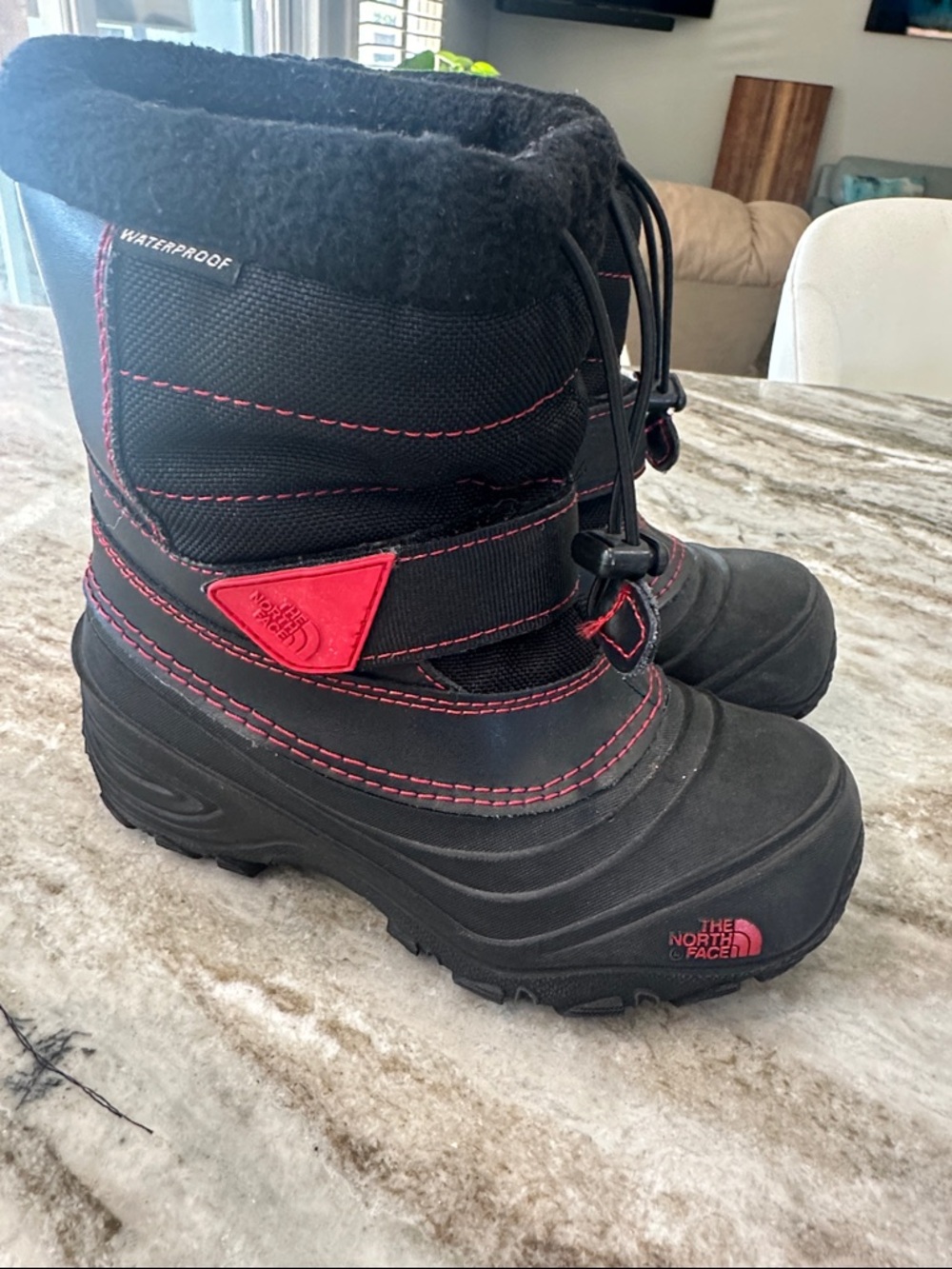The North Face Black Kids Waterproof Winter Boots with Pink Stitching